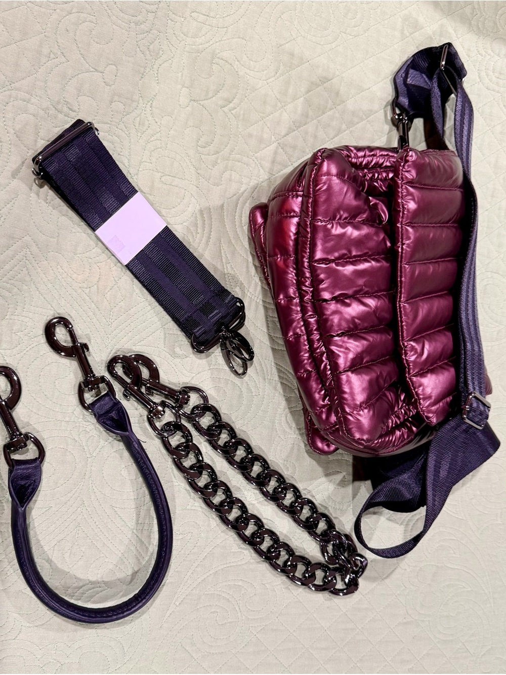 THINK ROYLYN Quilted Puffer Crossbody Bag in Metallic Burgundy